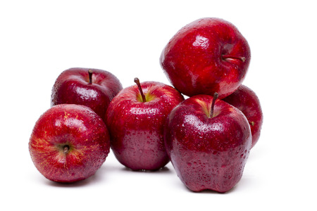 Close up view of some red apples isolated on a white background.の写真素材