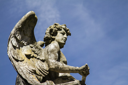 Close up view of a statue from a tomb in the famous portuguese cemetery Prazeres in Lisbon, Portugal.のeditorial素材
