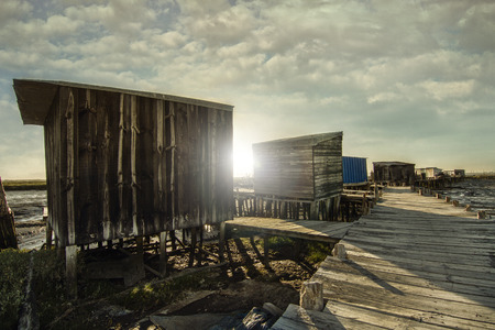 View of an old fisherman palaphitic pier on the Sado marshlands.の写真素材