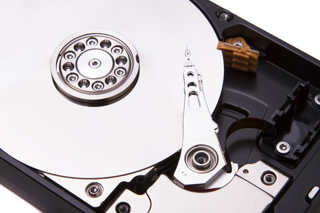 Close up view of a computer hard drive isolated on a white .