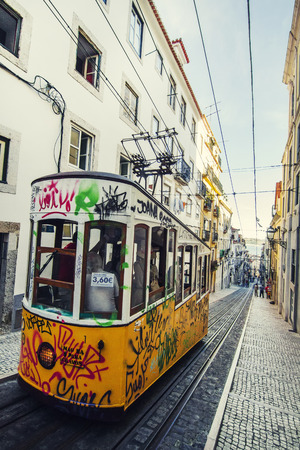 View of the famous lift of vintage electric tram of Bica, located in Lisbon, Portugal.のeditorial素材