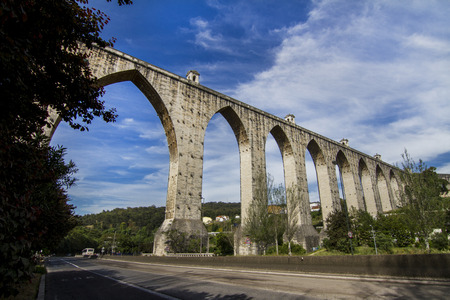View of the landmark aqueduct located in Lisbon, Portugal.の写真素材
