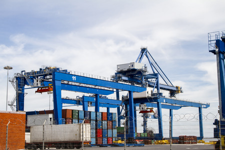 View of cargo container docks located in Lisbon, Portugal.