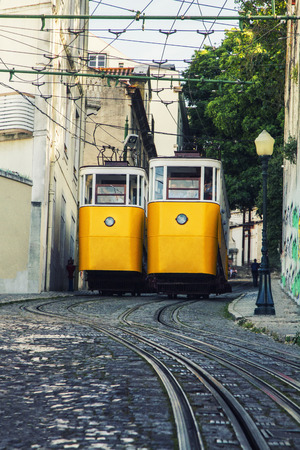 View of the famous lift of vintage electric tram of Gloria, located in Lisbon, Portugal.の写真素材