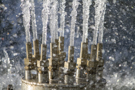 Close up macro view of a burst of many tiny water droplets.の写真素材