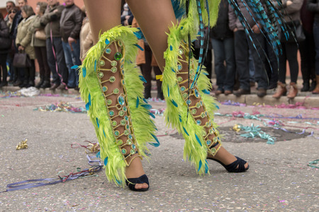 Close up view of a woman's legs in a Carnival parade.
