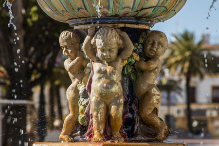 Close up view of a historical urban fountain located in Ayamonte, Spain.の写真素材