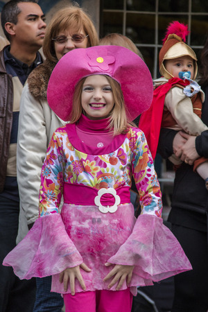 LOULE, PORTUGAL - FEB 2015: Colorful Carnival (Carnaval) Parade festival participants on Loule city, Portugal.のeditorial素材