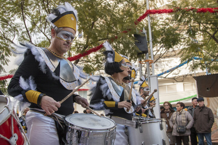 LOULE, PORTUGAL - FEB 2015: Colorful Carnival (Carnaval) Parade festival participants on Loule city, Portugal.のeditorial素材
