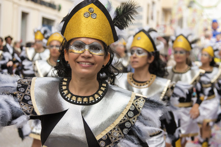 LOULE, PORTUGAL - FEB 2015: Colorful Carnival (Carnaval) Parade festival participants on Loule city, Portugal.のeditorial素材