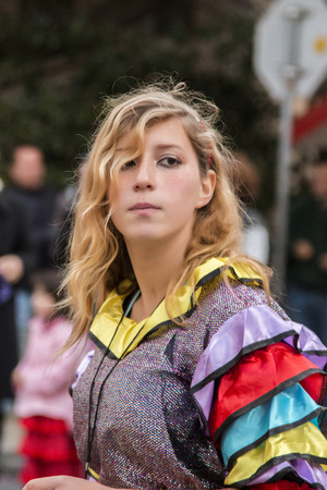 LOULE, PORTUGAL - FEB 2015: Colorful Carnival (Carnaval) Parade festival participants on Loule city, Portugal.のeditorial素材
