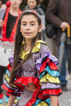 LOULE, PORTUGAL - FEB 2015: Colorful Carnival (Carnaval) Parade festival participants on Loule city, Portugal.のeditorial素材