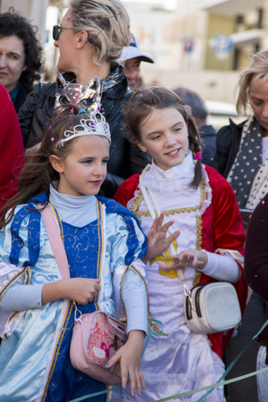 LOULE, PORTUGAL - FEB 2015: Colorful Carnival (Carnaval) Parade festival participants on Loule city, Portugal.のeditorial素材