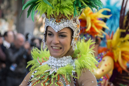 LOULE, PORTUGAL - FEB 2015: Colorful Carnival (Carnaval) Parade festival participants on Loule city,...