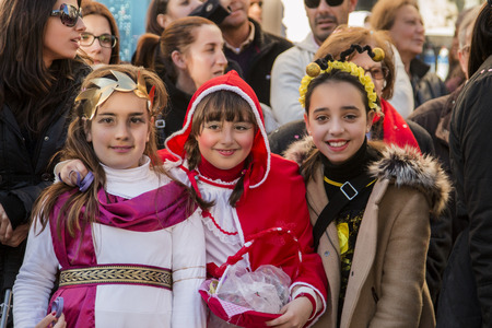 LOULE, PORTUGAL - FEB 2015: Colorful Carnival (Carnaval) Parade festival participants on Loule city, Portugal.のeditorial素材