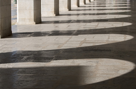 View of the beautiful arcs in Tavira city, Portugal.の写真素材