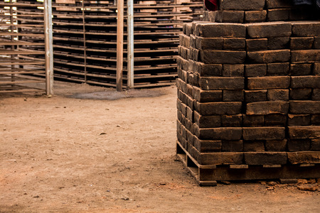 Close view of a pile of traditional mud bricks production.の写真素材