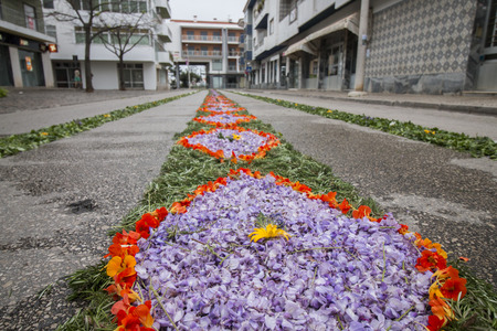 SAO BRAS DE ALPORTEL, PORTUGAL - April, 2015: Traditional religious procession of the flower torches event located in village of Sao Bras de Alportel, Portugal.の写真素材