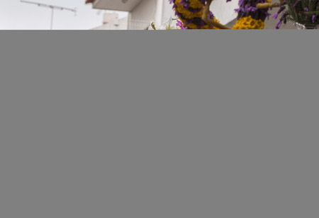 SAO BRAS DE ALPORTEL, PORTUGAL - April, 2015: Traditional religious procession of the flower torches event located in village of Sao Bras de Alportel, Portugal.のeditorial素材