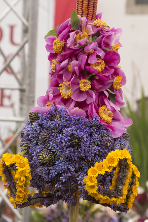 SAO BRAS DE ALPORTEL, PORTUGAL - April, 2015: Traditional religious procession of the flower torches event located in village of Sao Bras de Alportel, Portugal.のeditorial素材
