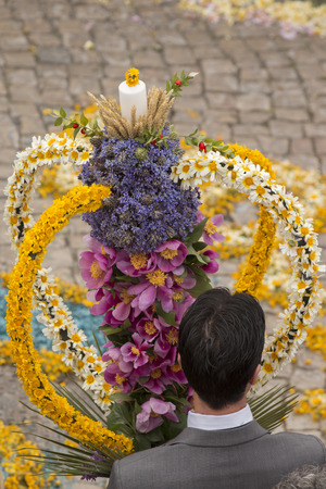 SAO BRAS DE ALPORTEL, PORTUGAL - April, 2015: Traditional religious procession of the flower torches event located in village of Sao Bras de Alportel, Portugal.のeditorial素材