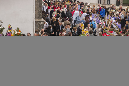 SAO BRAS DE ALPORTEL, PORTUGAL - April, 2015: Traditional religious procession of the flower torches event located in village of Sao Bras de Alportel, Portugal.のeditorial素材