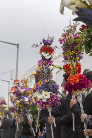 SAO BRAS DE ALPORTEL, PORTUGAL - April, 2015: Traditional religious procession of the flower torches event located in village of Sao Bras de Alportel, Portugal.のeditorial素材
