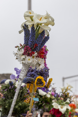 SAO BRAS DE ALPORTEL, PORTUGAL - April, 2015: Traditional religious procession of the flower torches event located in village of Sao Bras de Alportel, Portugal.のeditorial素材