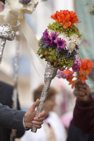 SAO BRAS DE ALPORTEL, PORTUGAL - April, 2015: Traditional religious procession of the flower torches event located in village of Sao Bras de Alportel, Portugal.のeditorial素材