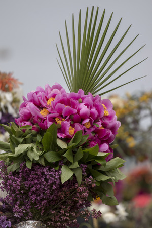 SAO BRAS DE ALPORTEL, PORTUGAL - April, 2015: Traditional religious procession of the flower torches event located in village of Sao Bras de Alportel, Portugal.のeditorial素材