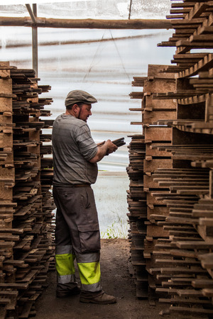 SAO BRAS DE ALPORTEL, PORTUGAL - April, 2015: View of a bed of traditional mud brick production factory.のeditorial素材