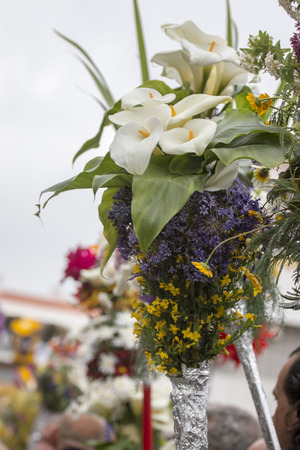 SAO BRAS DE ALPORTEL, PORTUGAL - April, 2015: Traditional religious procession of the flower torches event located in village of Sao Bras de Alportel, Portugal.のeditorial素材