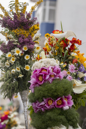 SAO BRAS DE ALPORTEL, PORTUGAL - April, 2015: Traditional religious procession of the flower torches event located in village of Sao Bras de Alportel, Portugal.のeditorial素材