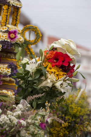 SAO BRAS DE ALPORTEL, PORTUGAL - April, 2015: Traditional religious procession of the flower torches event located in village of Sao Bras de Alportel, Portugal.のeditorial素材
