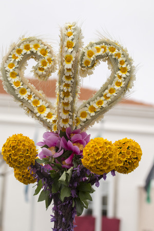 SAO BRAS DE ALPORTEL, PORTUGAL - April, 2015: Traditional religious procession of the flower torches event located in village of Sao Bras de Alportel, Portugal.のeditorial素材