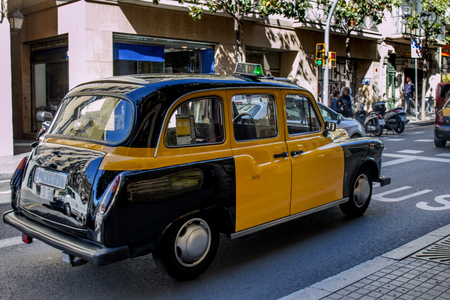 Close view of classic taxi car in Barcelona city, Spain.のeditorial素材