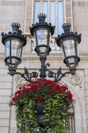 View of a detail of an antique streetlight in Barcelona, Spain.の写真素材