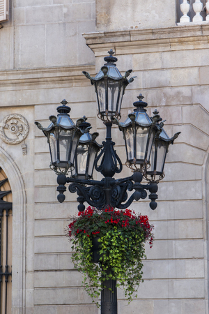 View of a detail of an antique streetlight in Barcelona, Spain.の写真素材