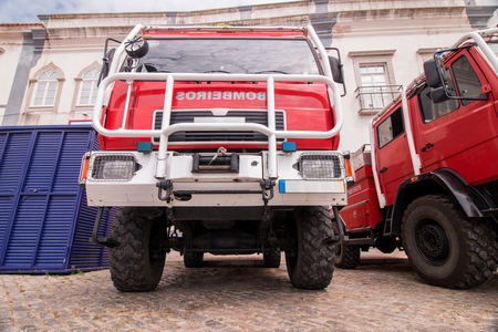Wide perspective view of several fire trucks parked in Faro city, Portugal.