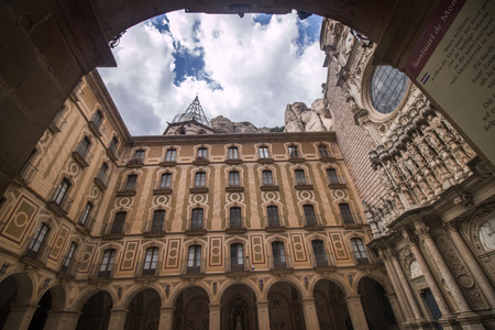 View of the famous benedictine abbey in the Montserrat mountains, located near Barcelona city, Spain.の写真素材