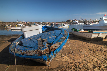 Traditional fishing boats on the sand in Isla del Moral, Spainの写真素材