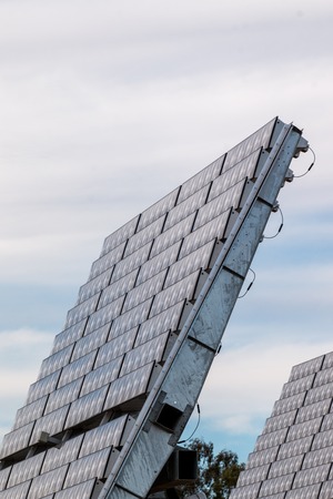 Upward close view of a photovoltaic solar panel gathering energy.