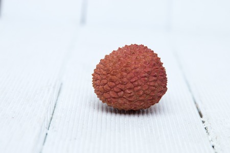 Close up view of the lychee tropical fruit on a white background.の写真素材