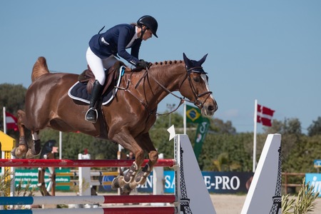 VILAMOURA, PORTUGAL - APRIL 2, 2016: Horse obstacle jumping competiion, called Vilamoura Atlantic Tour that brings the finest athletes to the event.のeditorial素材
