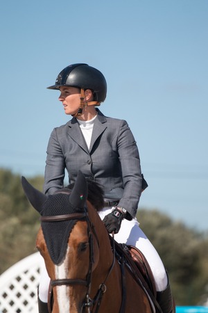VILAMOURA, PORTUGAL - APRIL 2, 2016: Horse obstacle jumping competiion, called Vilamoura Atlantic Tour that brings the finest athletes to the event.のeditorial素材