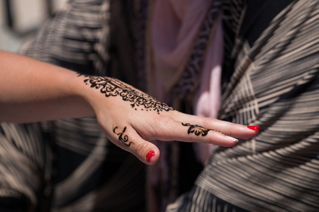 View of a henna tattoo applied over a girl's hand.の写真素材