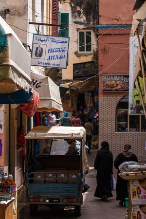 TANGIER, MOROCCO - JUNE 9, 2016: Motorcycle runs of the streets of the old Medina in Tangier city, Morocco.のeditorial素材
