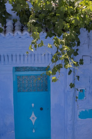 View of typical blue door architecture in Chefchaouen city, Morocco.の写真素材