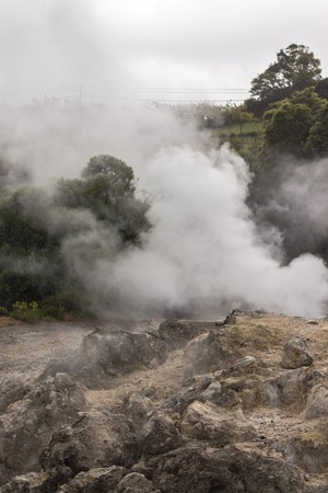 Fumarolas near Furnas, famous tourist atraction of volcanic activity in Sao Miguel island, Portugal.の写真素材