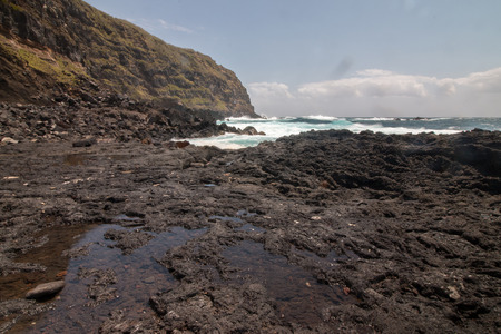 Landscape view of volcanic Ponta da Ferraria coastline in Azores, Portugal.の写真素材
